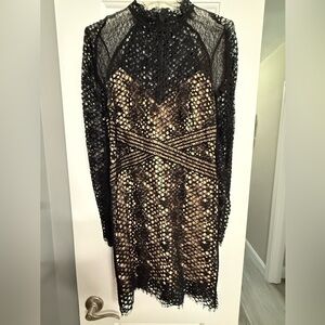 Bardot long sleeve lace sheath Dress in black with nude lining size 8